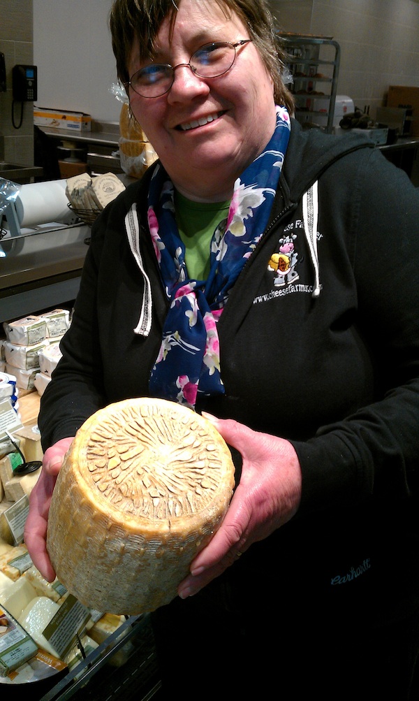 Marge Randles with her Grace cheese wheel