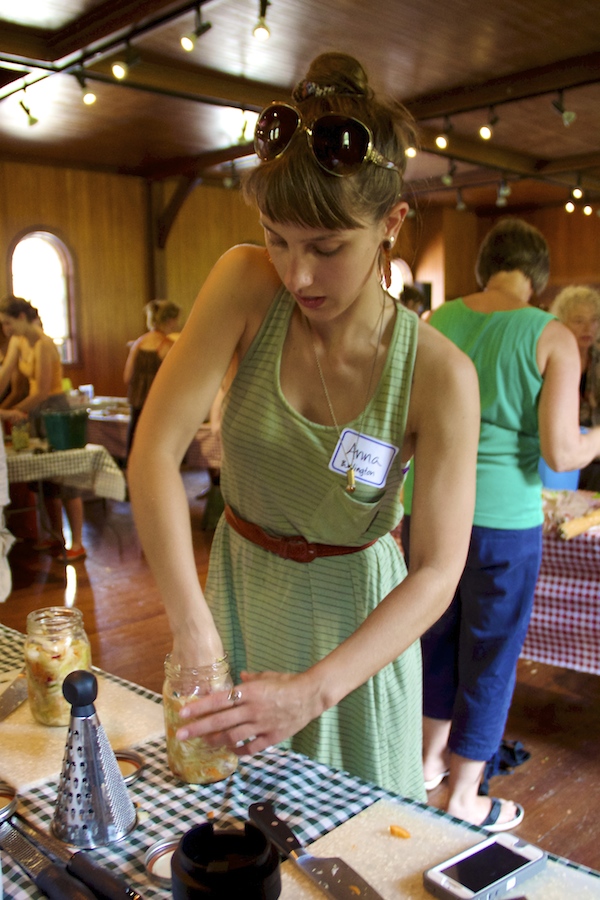 I wear my usual concentration face as I compress my kraut to make the brine rise