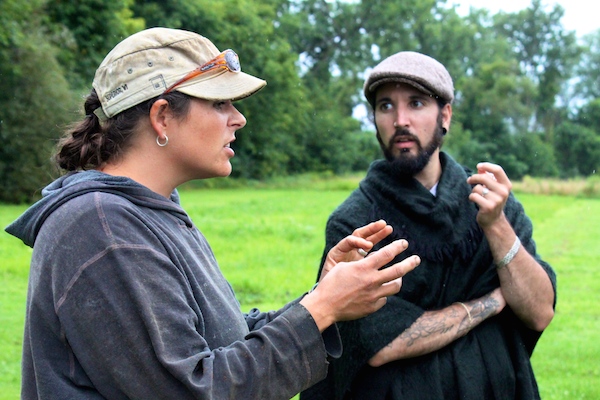Mara explaining to Rob how best to stuff a squash blossom (with lots of cheese, of course!)