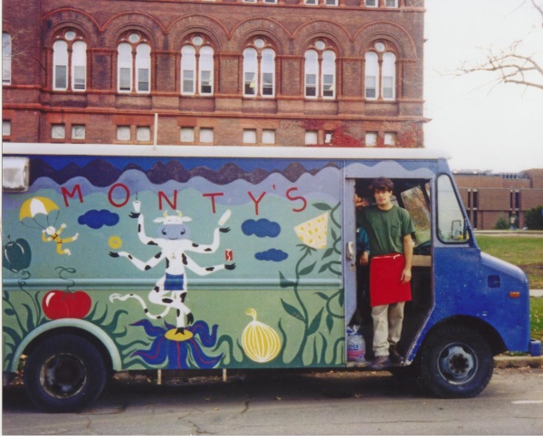 Owner Chris Hathaway in 1994 at his food truck at UVM where it all started